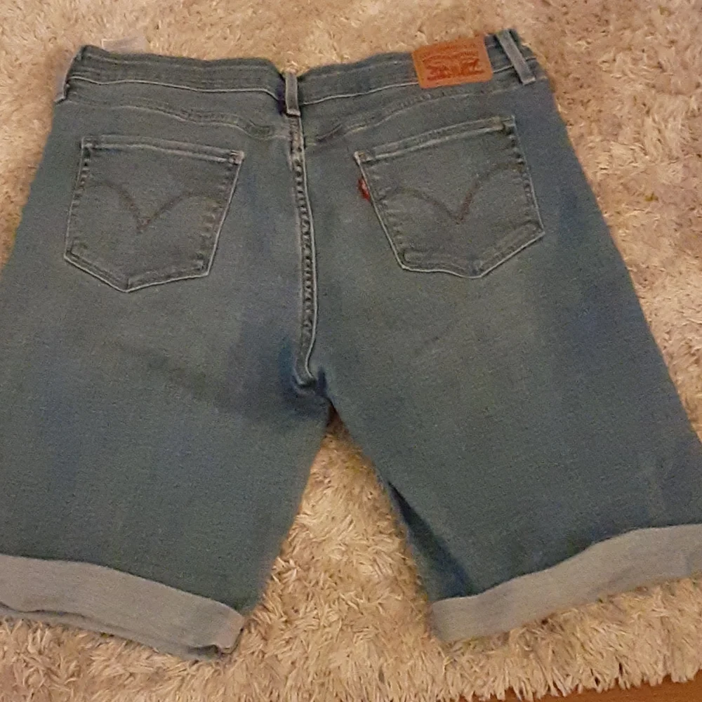 Levi's classic factory distressed stretch blue jeans denim shorts size 31 EUC…